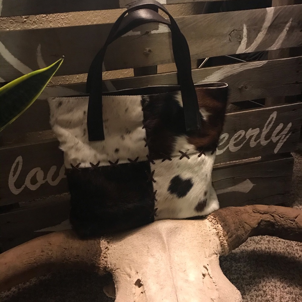 Cowhide and genuine leather purse